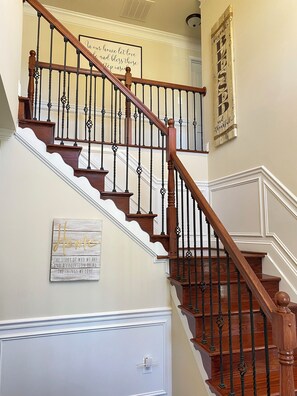 Head upstairs to one of 4 thoughtfully decorated bedrooms & 2 full baths