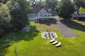 Spacious backyard leading to the fire pit area—plenty of room to relax and enjoy nature!