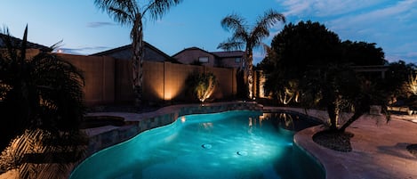 Back yard and pool lit up at night is breath taking!