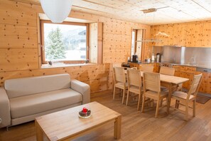Living area with open-plan kitchen