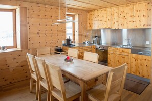 Living area with open-plan kitchen