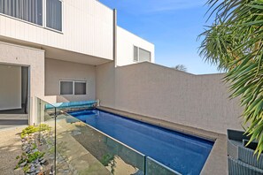 This stunning townhouse with a private pool is the perfect setting for a memorable coastal getaway