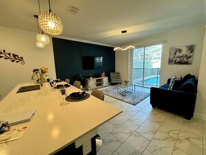 Sit together, have fun, watch television or eat together you have all the option in our dining plus living area