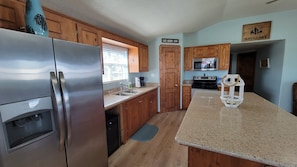 This fully stocked kitchen has everything you need to make a delicious dinner.