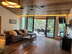 Open concept, kitchen, dining and living area. Outside dining just steps away.