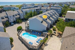 Comm pool is only 1 condo away!