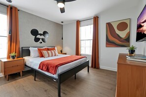 This modern Mickey room is perfect for the older kids who say they are “too old” to sleep in a themed room. 