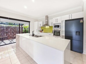 Fully equipped kitchen with modern appliances