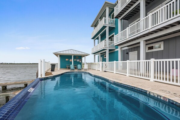 Waterfront swimming pool that is heated for enjoyment in the winter months as well as summer