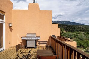 Southern view from  cedar deck, propane grill, seating.