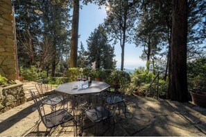 Sipping wine in the woods overlooking Florence