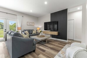 Enjoy a movie with the family, or catch a game on the 75" Smart TV.