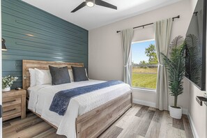 Bedroom 3. King bed. 65" smart TV. Noise machine. Blackout curtains.