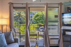 Tropical foliage views from this quaint studio