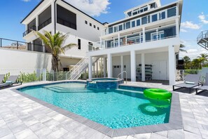 Private beachfront pool and 3-story luxury home steps from the ocean