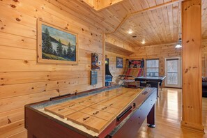 Game on! Unleash the fun in the ultimate lower-level game room oasis