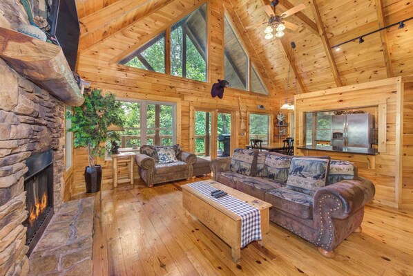 Cozy and spacious living area with TV