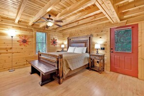 The first-floor king suite includes a private en suite, Smart TV, & deck access