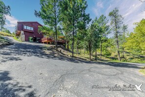Grindstone Casa Escondida welcomes all.  Main paved driveway.