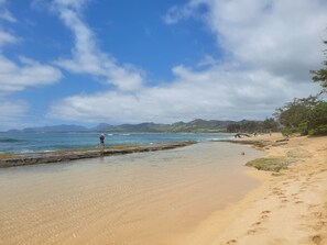 This little hidden gem of a beach is a few minutes walk north of the complex.