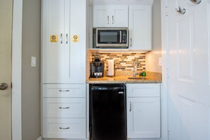 Grab a coffee or light snack from the kitchenette before heading out to explore the vibrant sights and sounds of Key West.