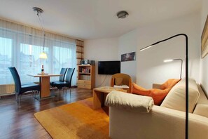 Fewo 24 Residenz Meeresbrandung Duhnen - Wohn- und Essbereich