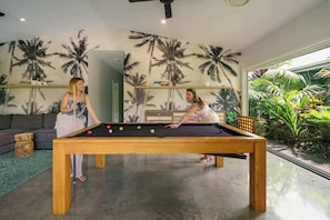 Enjoy the biliards table located in the second indoor living space