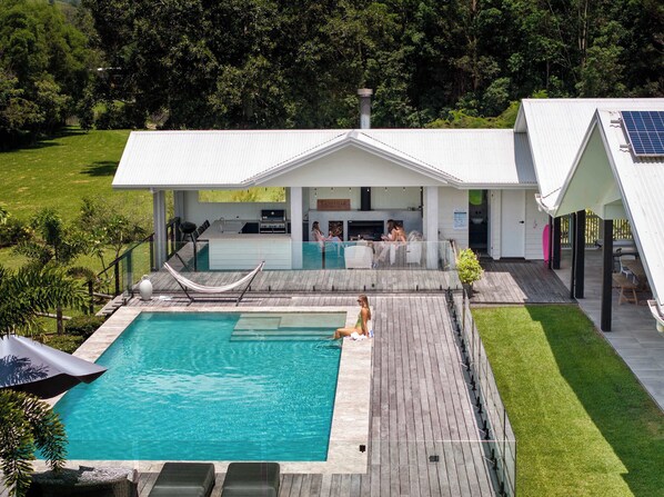 The Langville Estate is an expansive luxury home with everything you need for a truly unique escape without leaving the home. With expansive decks, large pool and mulitple indoor & outdoor living and entertaining spaces, a movie theatre, yoga retreat