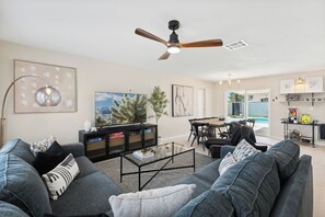 Relax in the living room with high end furnishings and several entertainment options.  The sofa includes a queen sized sleeper as well.