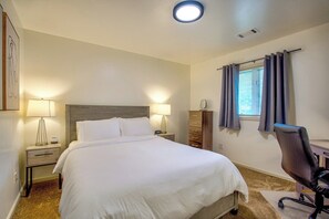 Indulge in comfort in our spacious bedroom, featuring a dreamy king-size bed for the master bedroom and a full bed for a truly restful sleep.