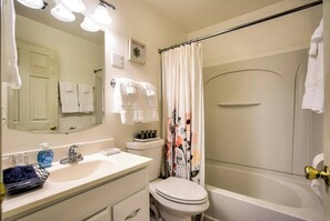 Step into a haven of cleanliness in our well-maintained bathroom, complete with a sparkling bathtub for a blissful bathing experience.