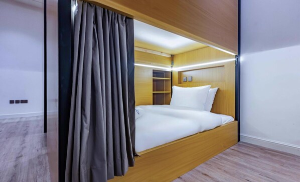 Capsule Bed with blackout curtains
