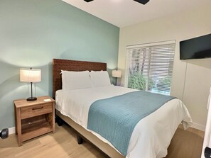 The second bedroom also offers a comfortable queen bed, a SmartTV for your entertainment, and ample closet storage to make your stay even more convenient.