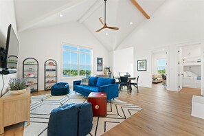 3rd Floor: Game Room with card/puzzle table, board games, xbox 360, Roku TV, pac-man arcade, and fooseball table. (4) single bunks with black out shades at window