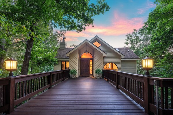 Arrive in style as you cross the elegant bridge to your cozy retreat. 
