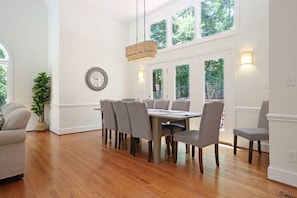 Dining area with large table and10 dining chairs