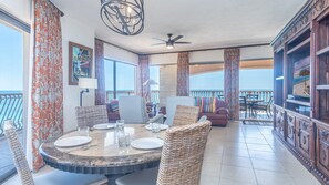 The main room has plenty of space, a large entertainment center, living room and dining table.