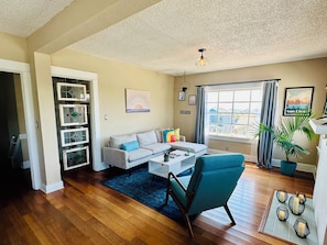 Living room with sleeper sofa and 58" smart TV