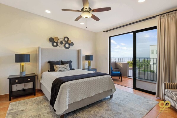 The upper level master bedroom comes with a view