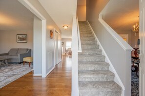 Entry way into the home, leading up the stairs are the 3 bedrooms available for guests.