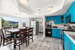 Enjoy the breathtaking mountain views from the kitchen and dining table.