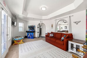 There is a game room that includes arcade games, a large TV, foosball and plenty of board games for the entire group to enjoy.