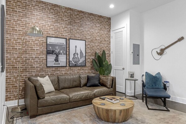 Inviting living room with cozy seating and Smart TV