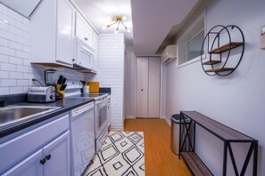 Kitchen with Keurig, blender, toaster, electric stove top and more