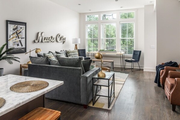 Open living space with sofa bed, and Smart TV