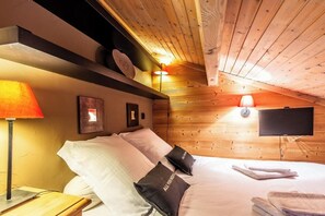 small bedroom area at the top of the stairs - under the eaves