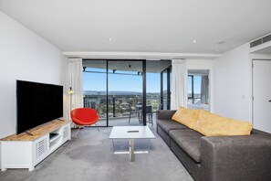 Get comfy in the living room, with a large screen TV, board games and books for your entertainment.
