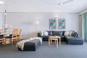 A large leather lounge provides ample space to relax after a day at the beach.