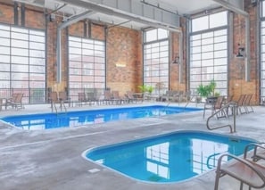 Rain or shine, enjoy the community pool & hot tub at Central Lofts. During the cooler months, enjoy the enclosed heated pool and hot tub area.
