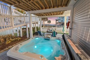 The spacious hot tub with seating up to 7 becomes the ultimate haven for relaxation during the tranquil nights.